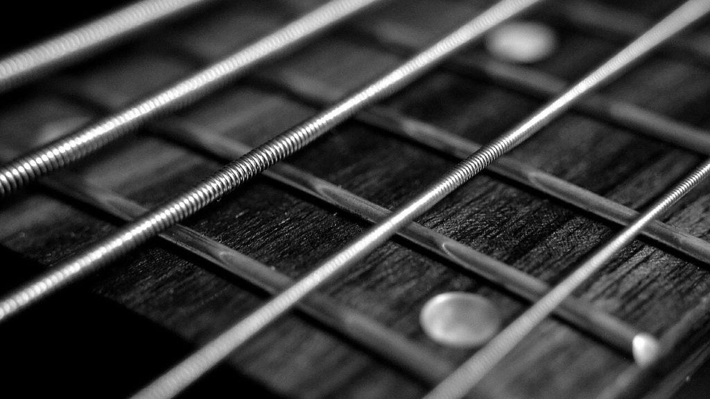 Guitar strings placed diagonally for image effect.