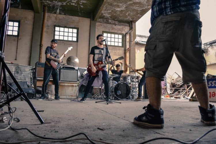 Band playing in building. Band playing in building. Buenos Aires, Argentina, En la grabación de la Band Paper Rockets Photo by Hernan Carlos on Unsplash