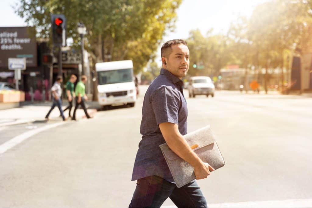 Salesman working and looking for new customers on the streets.