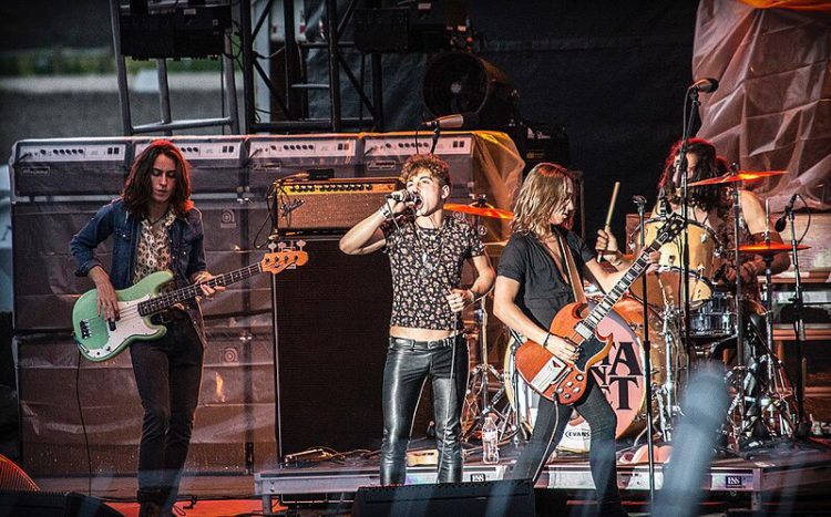 Greta Van Fleet performing on stage in North Dakota. Having fun. Troy Larson photo.