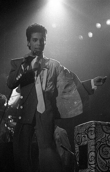 Prince singing with microphone. Early picture. Image from commons.m.media.org