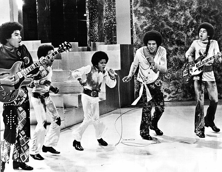 Michael Jackson dancing with brothers, the Jackson 5. Photo from the Jackson 5's first television special in 1971.