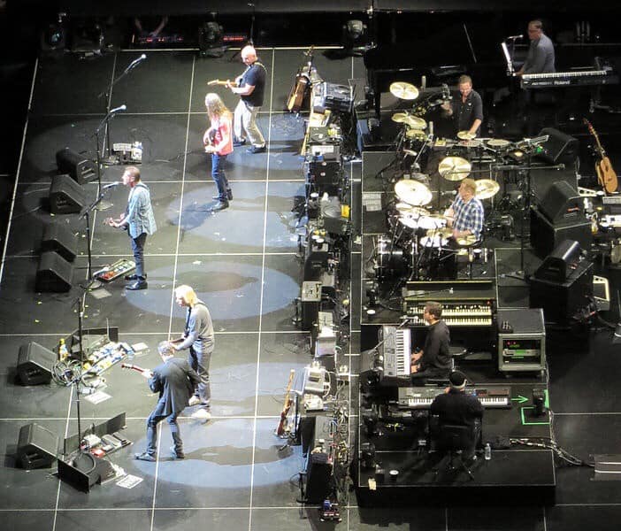 Great top view from camera of the EAGLES band playing their instruments.