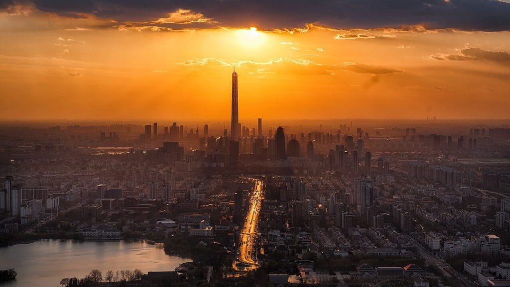 Glorious sunset shining down on skyscrapers, in the city.