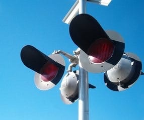 Red Railroad train track lights, on a pole.