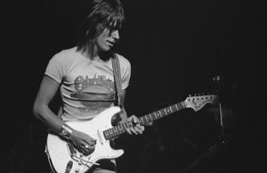 Jeff Beck famous guitarist playing guitar. Black and white picture.