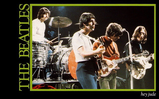 The Beatles playing their instruments. Guitars,Bass and drums. Photo courtesy of Lawren on flickr.com