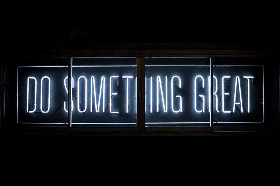 Do Something Great Women blue light neon sign.