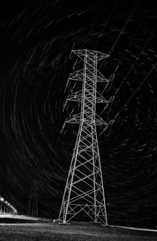 Electricity pole delivering electricity.