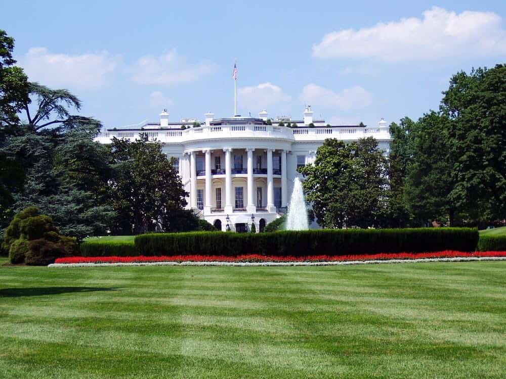 The White House with lawn mowed and very beautiful scenery.